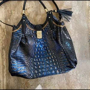 Brahmin satchel in vibrant blue, black and gold.